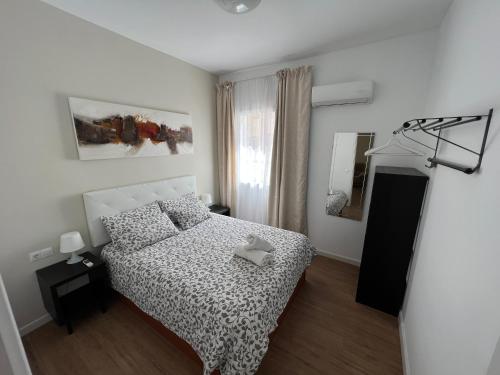 Posteľ alebo postele v izbe v ubytovaní GENUAR APARTMENTS 3 Bedroom close to beach