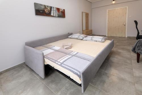 Voodi või voodid majutusasutuse Stay Here - Διαμέρισμα στο κέντρο του Βόλου toas