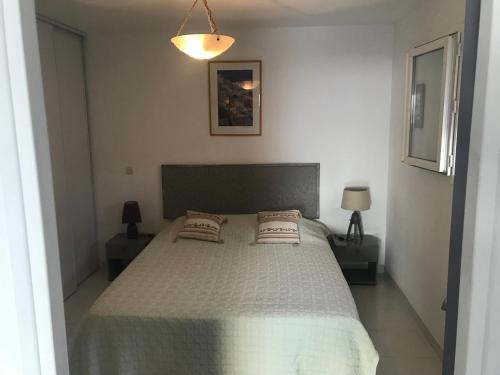 Posteľ alebo postele v izbe v ubytovaní Clement - Rez de villa - Vue Mer