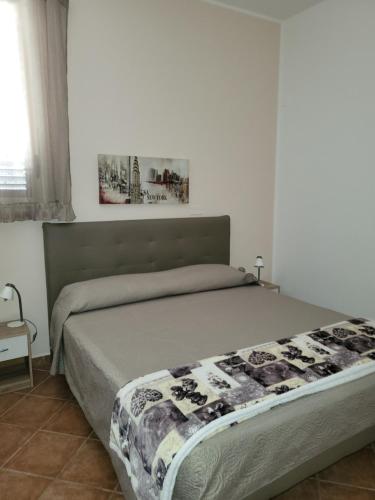 En eller flere senger på et rom på Villa enza
