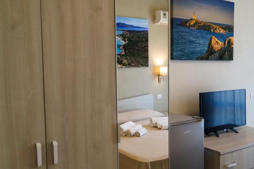Postel nebo postele na pokoji v ubytování Casa Tacconi