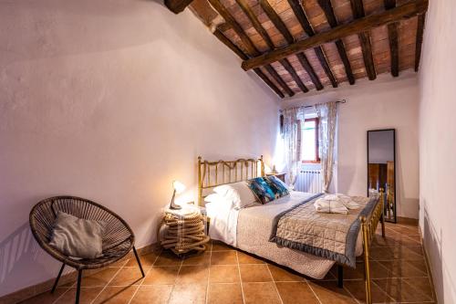 Postel nebo postele na pokoji v ubytování Agri Apartment La Terrazza La Ripadoro