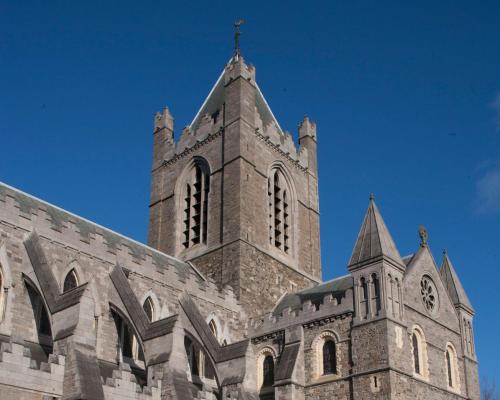 an old church with a tower on top of it at Hyatt Centric The Liberties Dublin in Dublin