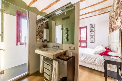 A bed or beds in a room at Casa Roja