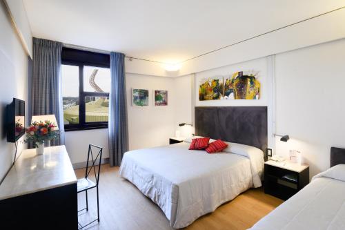 Postel nebo postele na pokoji v ubytování Art Hotel Museo