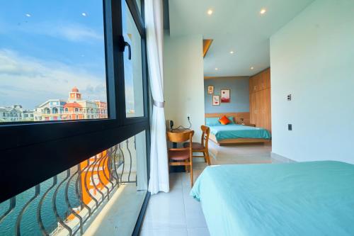 Giường trong phòng chung tại LIA Homestay Grand World Phu Quoc - Sunny Venice Apartment