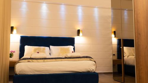 Letto o letti in una camera di Resort & Winery Bosco De Medici