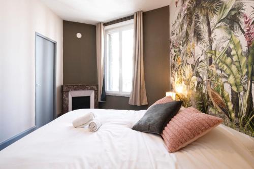 Postel nebo postele na pokoji v ubytování Le Reflet de Nancy