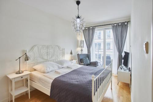 Postel nebo postele na pokoji v ubytování Apartament Familijny Golden