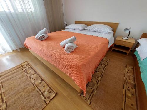 Łóżko lub łóżka w pokoju w obiekcie Apartment Bana