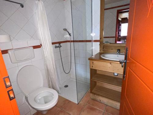 a bathroom with a shower and a toilet and a sink at Chalet Pra-Loup, 4 pièces, 10 personnes - FR-1-165A-62 in Uvernet