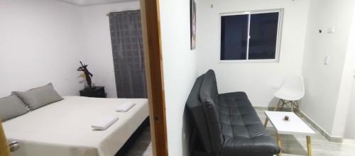 Un pat sau paturi într-o cameră la Apartamento Aires de sol