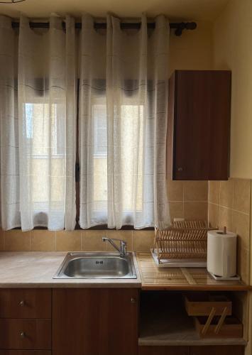 Η κουζίνα ή μικρή κουζίνα στο GK Apartment