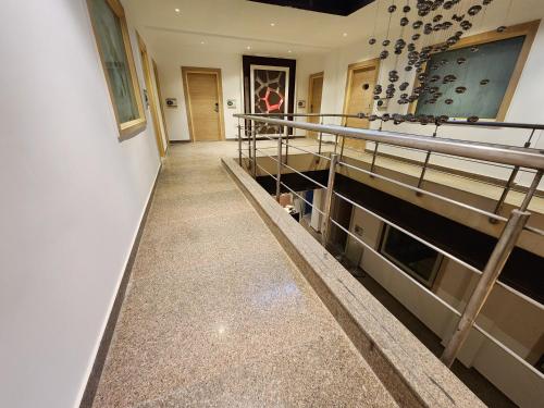 a hallway of a building with a lecture room at Square9 - A Boutique Hotel in Gurgaon