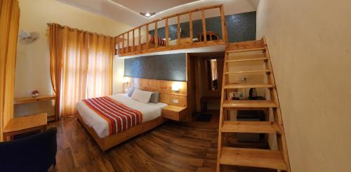 Postel nebo postele na pokoji v ubytování Namlang Resort