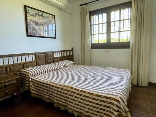 En eller flere senge i et værelse på Bell Racó B 25
