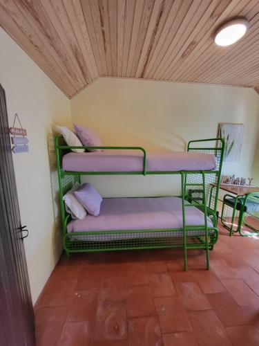 Katil atau katil-katil dalam bilik di Quinta da Mimosa
