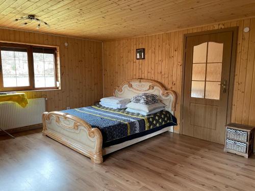 Postel nebo postele na pokoji v ubytování Kvasy 838
