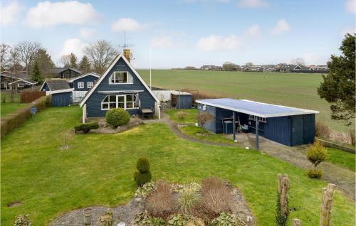 an aerial view of a house with a yard at Three-Bedroom Holiday Home In Otterup in Otterup