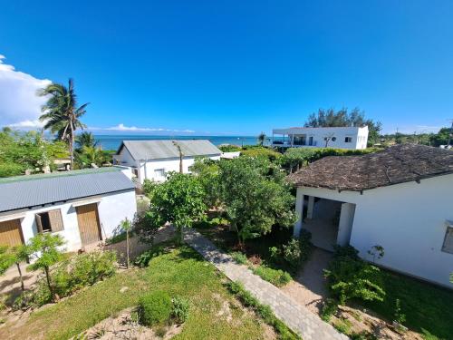 an aerial view of a house with the ocean in the background at Aux 2 Métis in Toliara