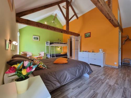 Postel nebo postele na pokoji v ubytování La Fresnée chambres d'hôtes