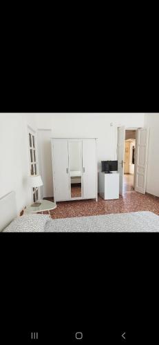 Ένα ή περισσότερα κρεβάτια σε δωμάτιο στο B&B L'Antico Ortale
