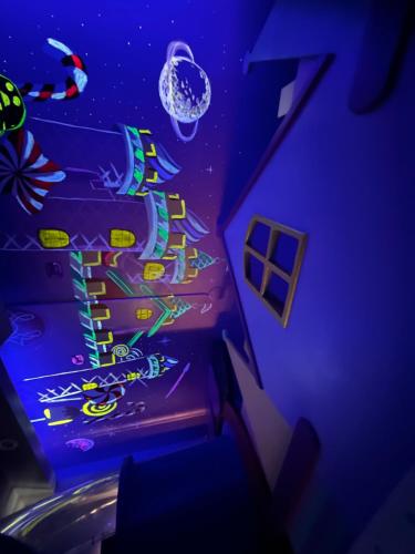 an overhead view of a room with a blue ceiling at Kaohsiung High Fun Hostel in Kaohsiung