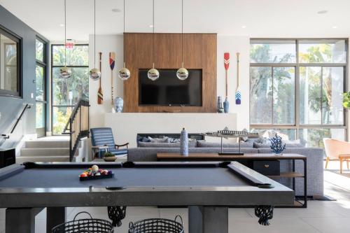 a living room with a pool table in it at Redondo Beach 1BR w Pool Gym WD nr Beach LAX-613 in Redondo Beach