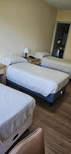 Postel nebo postele na pokoji v ubytování Hotel Klee