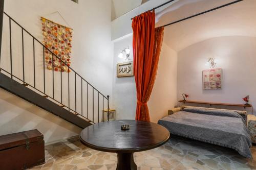 Posteľ alebo postele v izbe v ubytovaní Casa Isabella