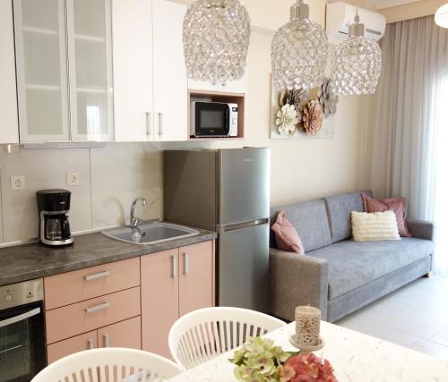 Virtuvė arba virtuvėlė apgyvendinimo įstaigoje Sun Angel apartment