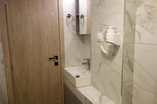 Vonios kambarys apgyvendinimo įstaigoje Sun Angel apartment