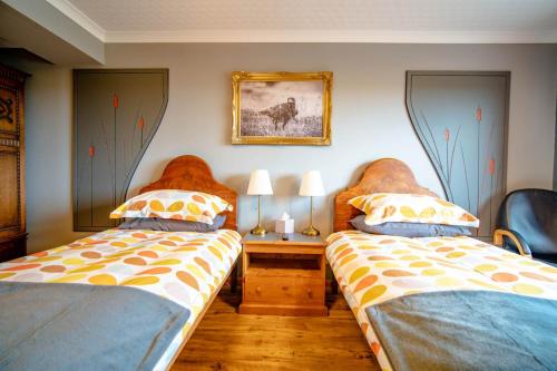 Postel nebo postele na pokoji v ubytování Burnside Cottage