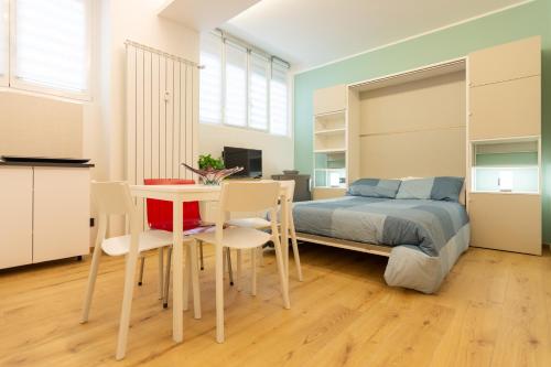 A bed or beds in a room at Italianflat - Vittoria Suite