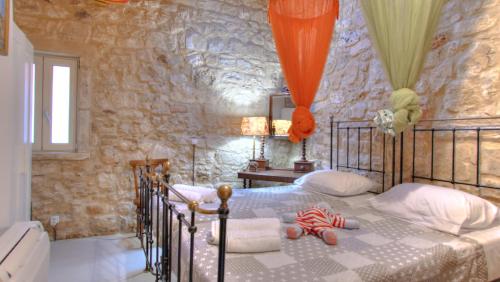 Postel nebo postele na pokoji v ubytování Heron's Path I