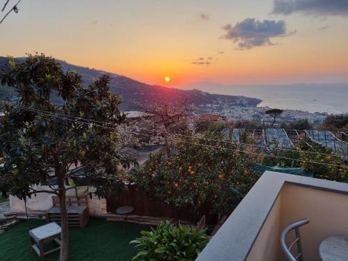 a view of the sunset from the balcony of a house at Nanninella hh in Sorrento