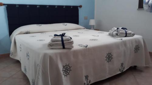 Postel nebo postele na pokoji v ubytování Appartamento vista mare