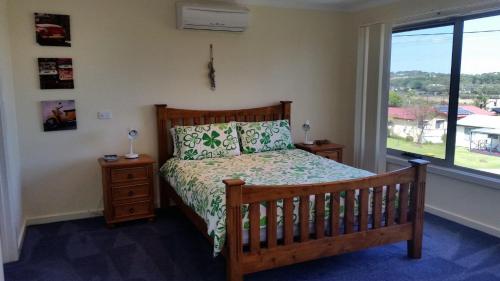 Ένα ή περισσότερα κρεβάτια σε δωμάτιο στο Red Rocks Road, Beach House in Cowes