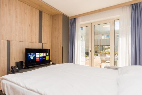 Ένα ή περισσότερα κρεβάτια σε δωμάτιο στο Apartma Palma Umag