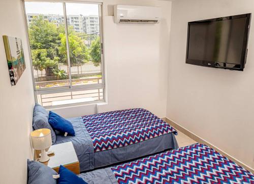 Una cama o camas en una habitación de Marquis Enclave, Condo With Pool Access and More