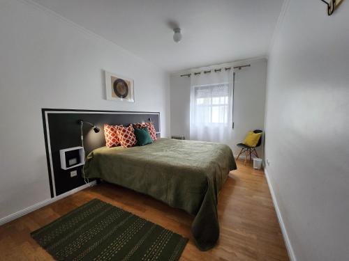 Postel nebo postele na pokoji v ubytování Cozy Island Apartment II RAAL 2162