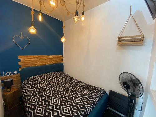 Postel nebo postele na pokoji v ubytování Appartement cosy à Nantes avec terrasse