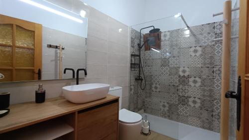 a bathroom with a sink and a shower at Casa Isabel 2 in Betancuría