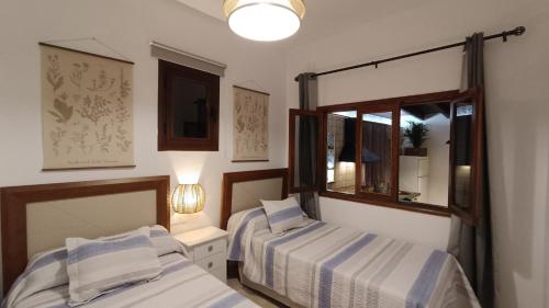 Cama ou camas em um quarto em Casa Isabel 2