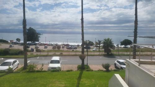 a view of a parking lot with cars parked at 13 at Santos in Mossel Bay