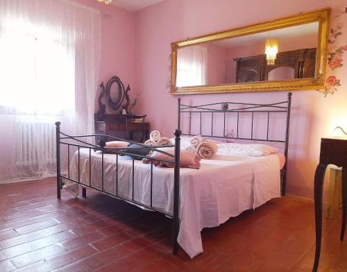 Posteľ alebo postele v izbe v ubytovaní APPARTAMENTO LA ZANZARA