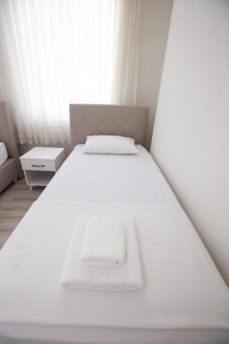 Cama o camas de una habitación en Villa Cennet Dalaman 11