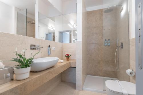Koupelna v ubytování Archè Design Rooms and Suites