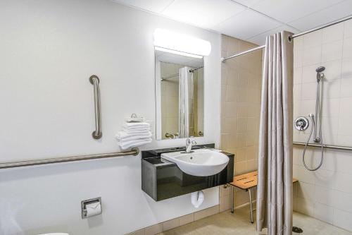a bathroom with a sink and a shower at Motel 6-Framingham, MA - Boston West in Framingham