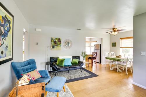 a living room with a couch and a table at Pet-Friendly San Diego Home with Patio 5 Mi to Dtwn in San Diego